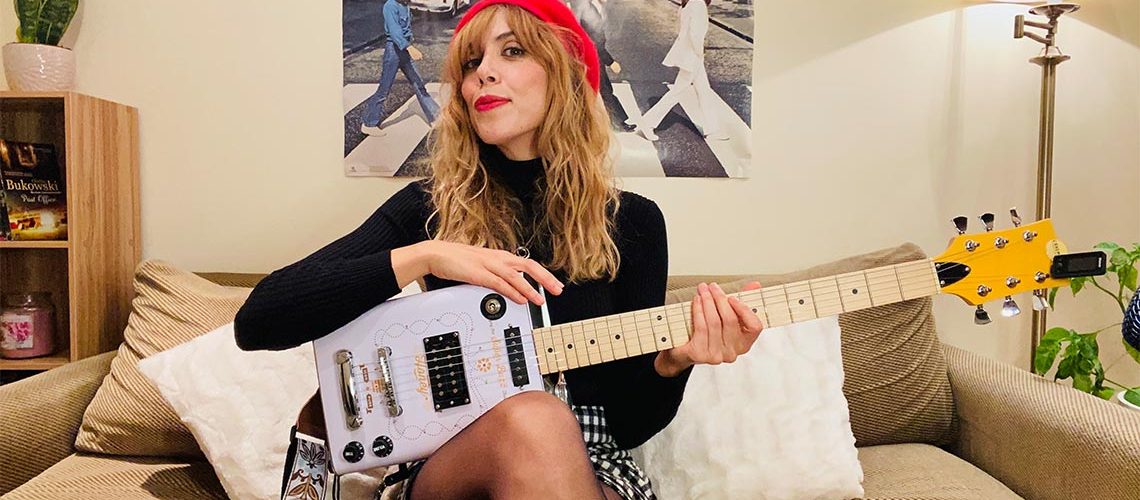 Logan J Parker: Features Bohemian ‘Honey’ Oil Can Guitar on her Christmas single: ‘Sweet Songs Of Love’